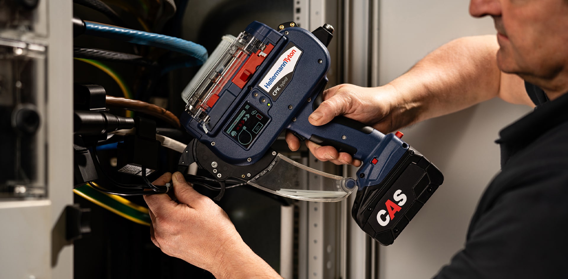 Craftsman works on electrics cordless using a tool with CAS battery